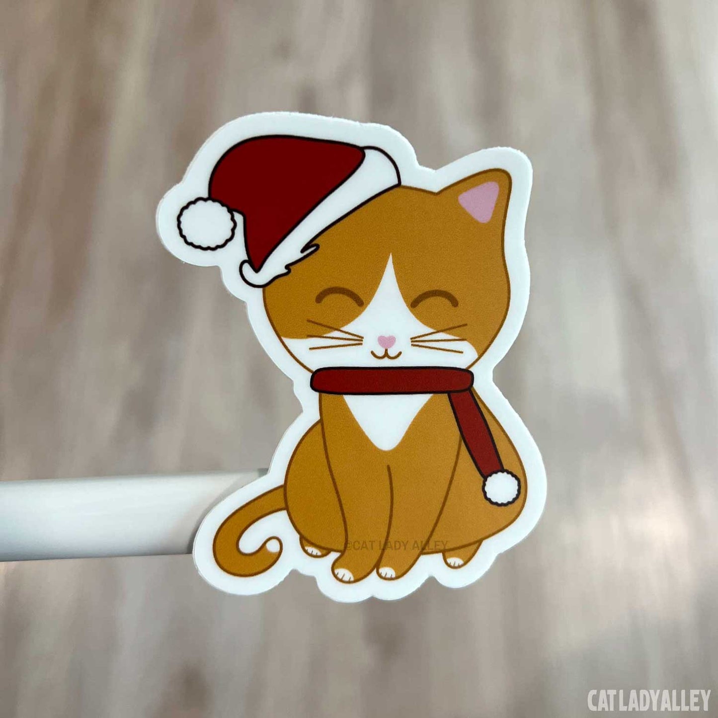 orange and white cat holiday sticker